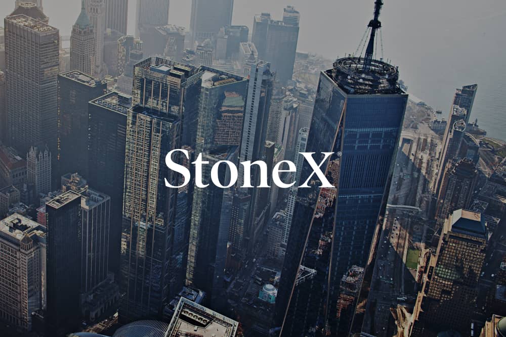 StoneX logo against background of city